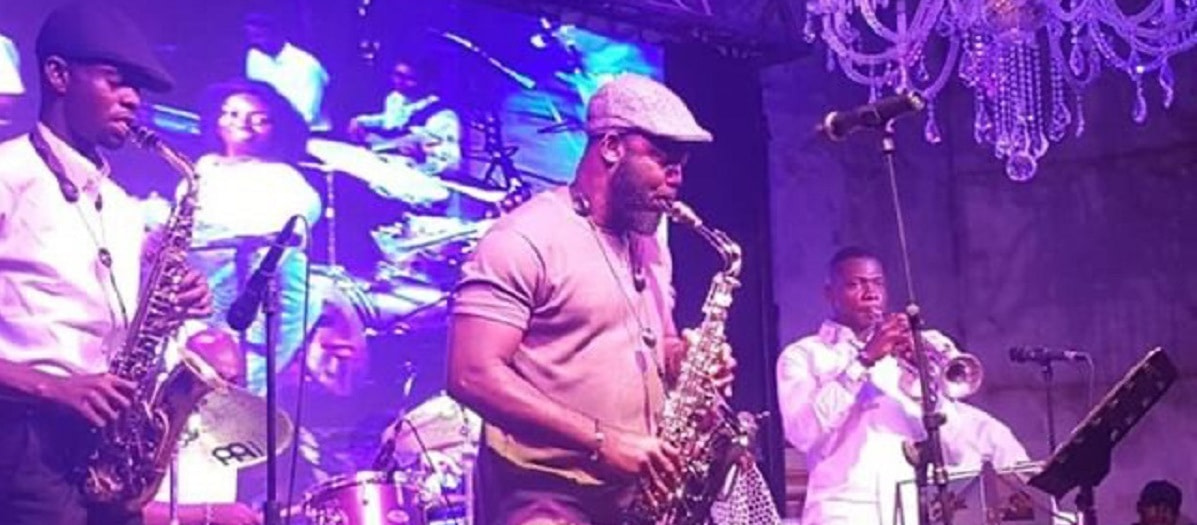 Shola Emmanuel African Jazz Saxophone player and people